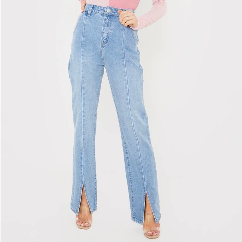 New with tags never worn. Side leg jeans with slit